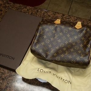 Gently used Speedy 30 Louis Vuitton hand bag